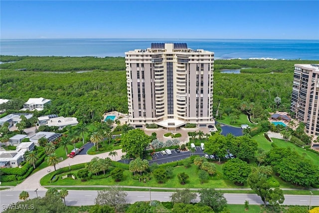 birds eye view of property featuring a water view