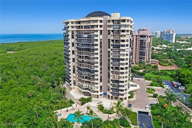 view of property with a water view