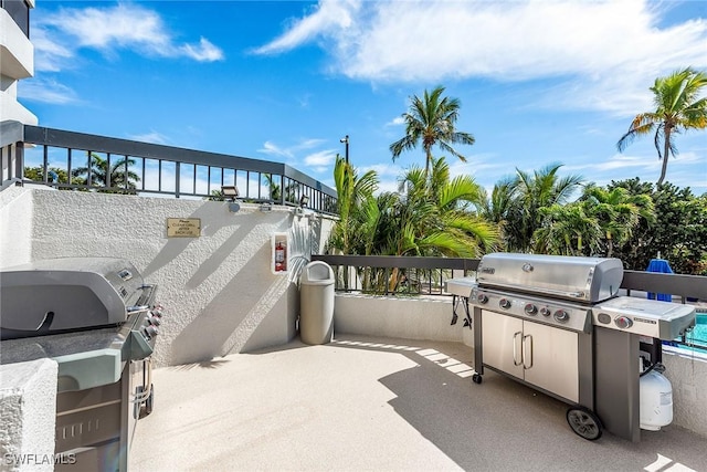 view of patio featuring a grill