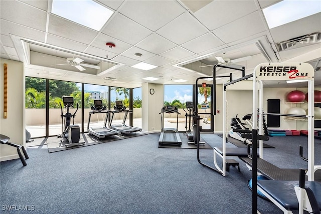 6001 Pelican Bay Blvd Unit 204, Naples, FL 34108 - workout area with ceiling fan and baseboards