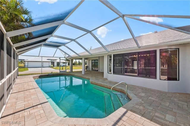 view of pool featuring a lanai and a patio