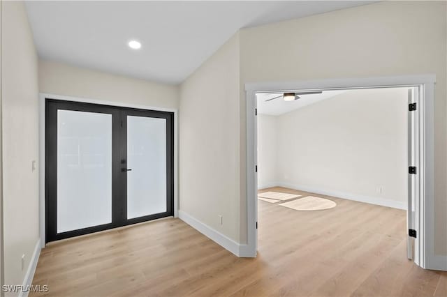 entrance foyer featuring french doors and light wood-type flooring