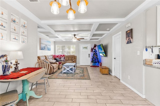 tiled living room with beam ceiling, ceiling fan, and coffered ceiling