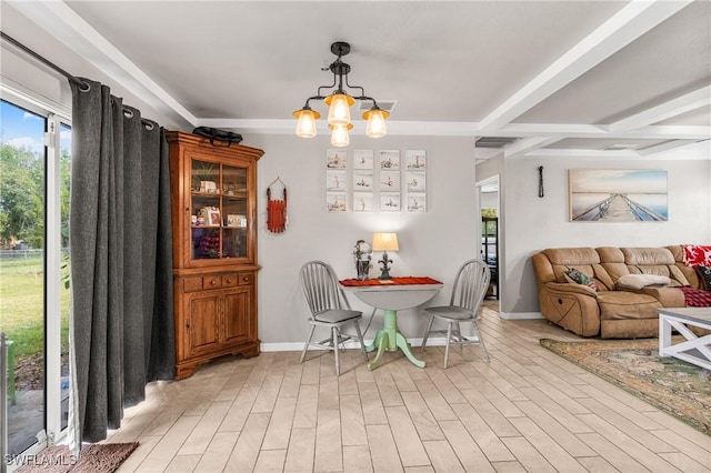 dining room featuring beamed ceiling, light wood-type flooring, and a chandelier