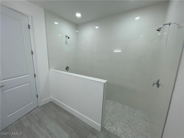 bathroom featuring a shower