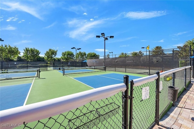 view of tennis court with basketball court