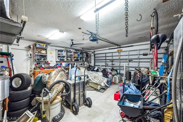 garage featuring a garage door opener and ceiling fan