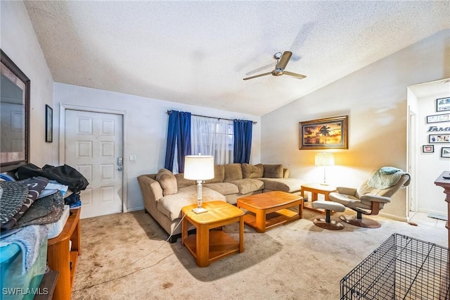 living room with a textured ceiling, ceiling fan, light carpet, and vaulted ceiling