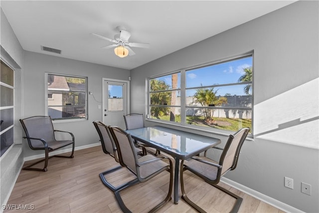 dining area featuring ceiling fan and light hardwood / wood-style floors