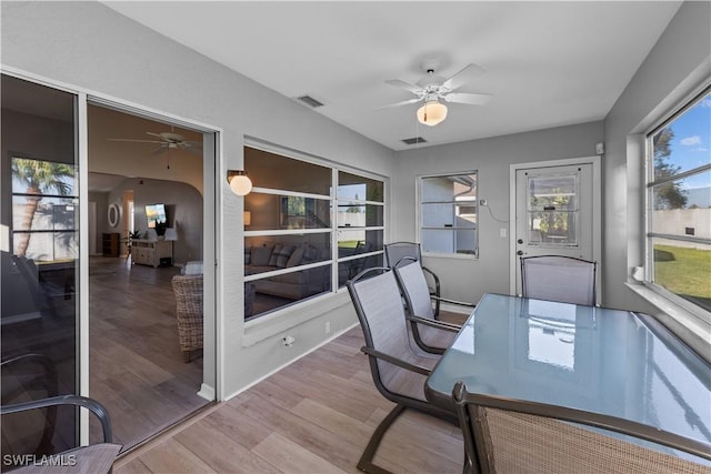 office space featuring hardwood / wood-style floors and ceiling fan