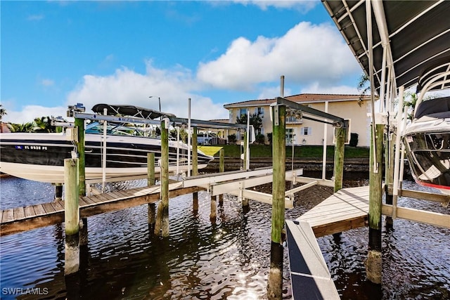 view of dock with a water view