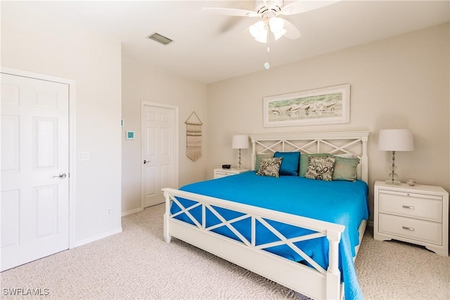 bedroom with ceiling fan and light colored carpet