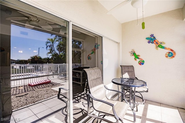 view of patio featuring a balcony