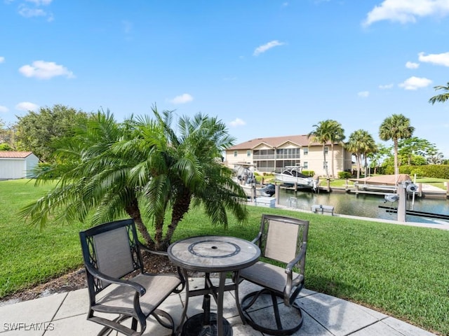 view of patio featuring a water view