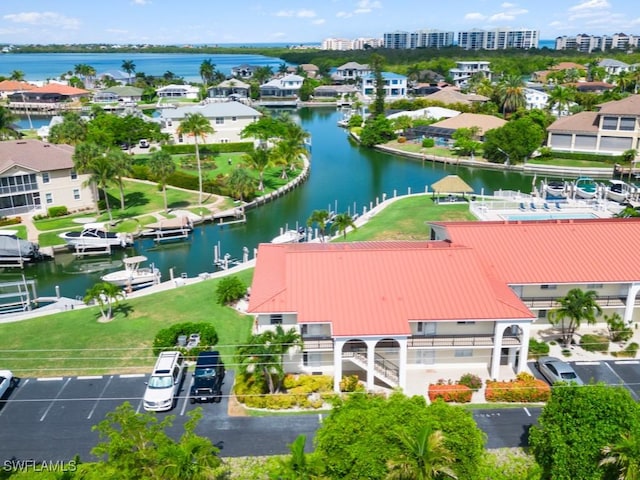 drone / aerial view featuring a water view