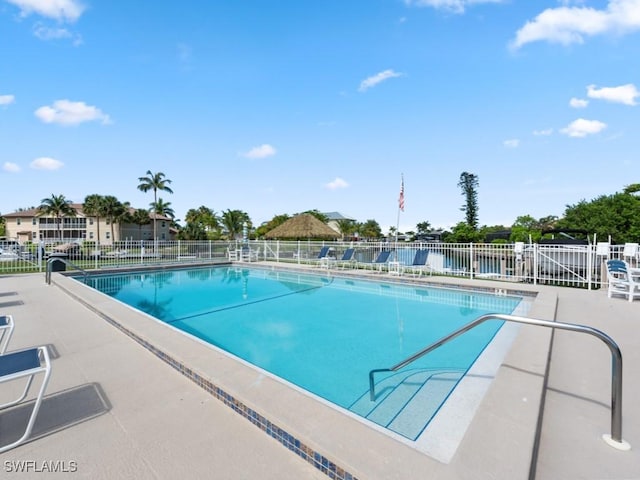 view of swimming pool featuring a patio area