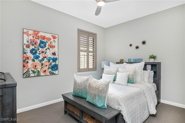 bedroom with ceiling fan and dark carpet