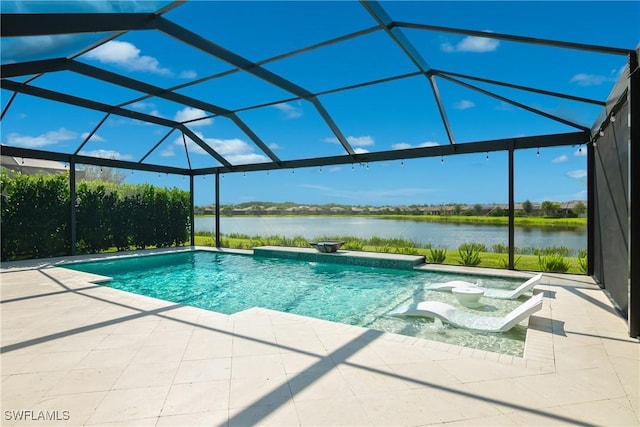 view of pool with a lanai, a patio area, and a water view