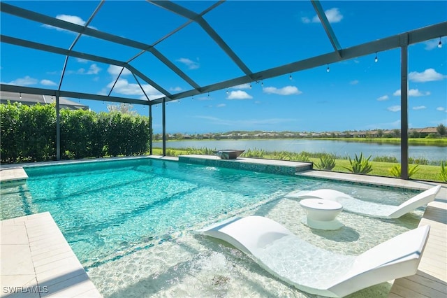 view of swimming pool with glass enclosure and a water view