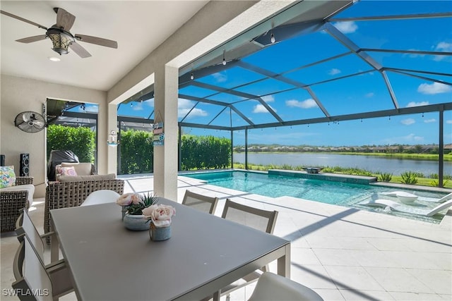 view of swimming pool with a lanai, an outdoor living space, ceiling fan, a water view, and a patio