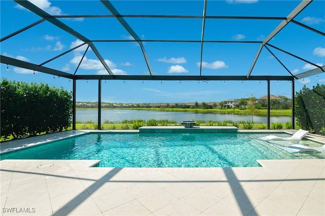 view of pool featuring glass enclosure, a water view, and a patio