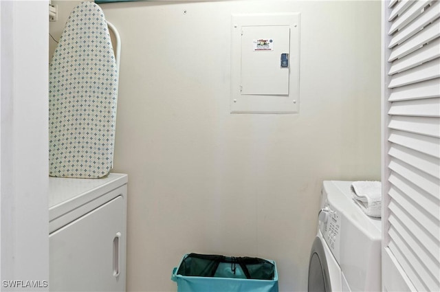 laundry room featuring separate washer and dryer and electric panel