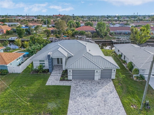 aerial view featuring a water view