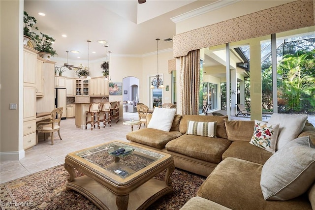 tiled living room featuring crown molding