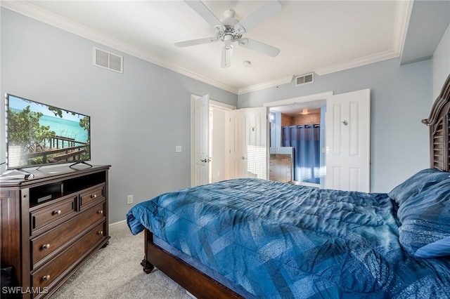 carpeted bedroom featuring ceiling fan and ornamental molding