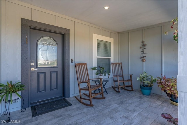 property entrance featuring covered porch