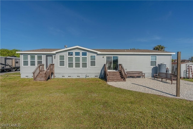 4008 24th Ave NE, Naples, FL 34120 - rear view of property featuring crawl space and a yard