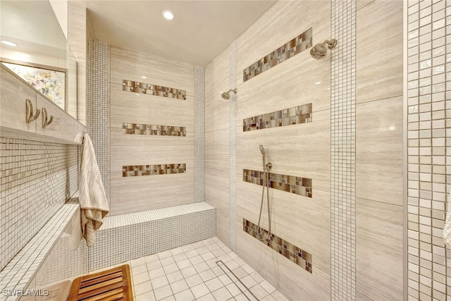 bathroom with tiled shower