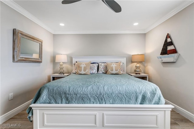 bedroom with hardwood / wood-style flooring, ornamental molding, and ceiling fan