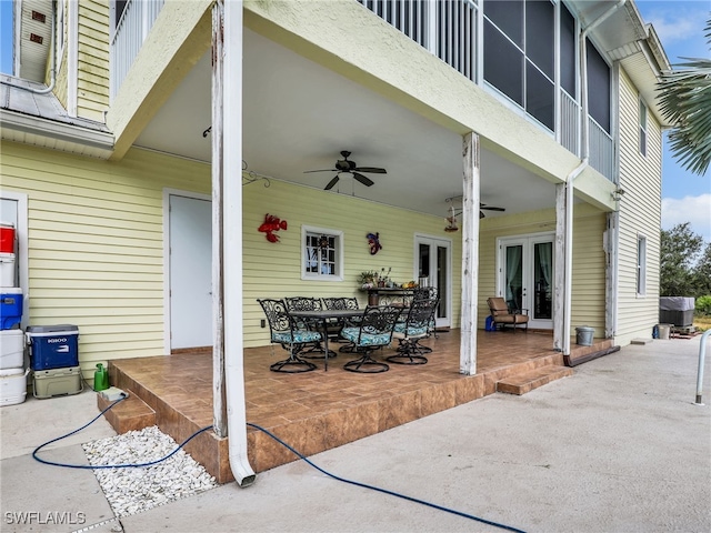 view of patio with french doors and ceiling fan