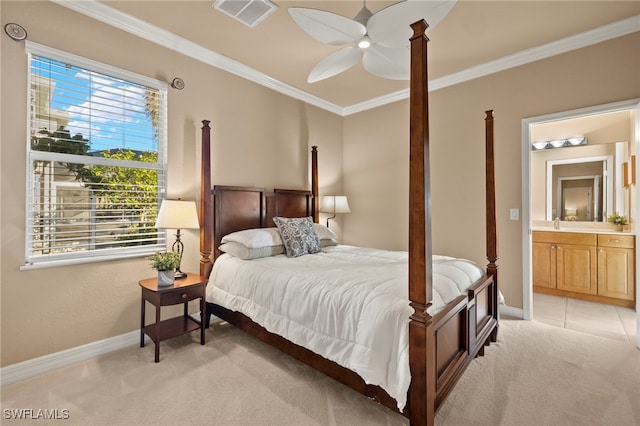 carpeted bedroom featuring connected bathroom, ceiling fan, and crown molding