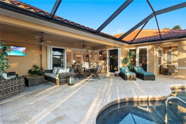 view of swimming pool featuring an outdoor living space, a patio, ceiling fan, and a lanai