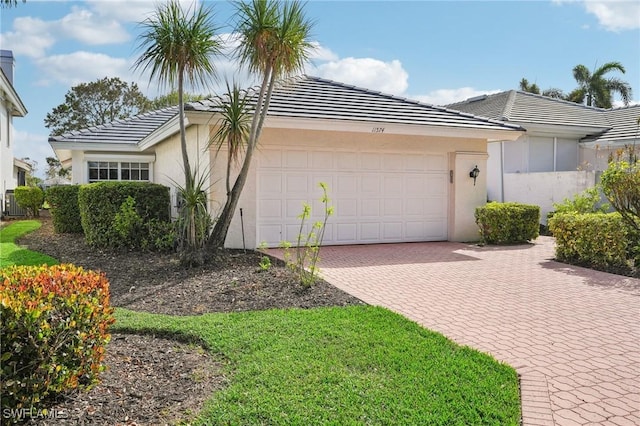 view of front of property featuring a garage