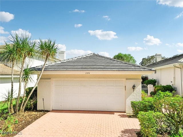 view of front of home with a garage