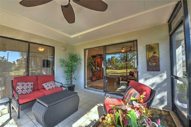 exterior space featuring ceiling fan