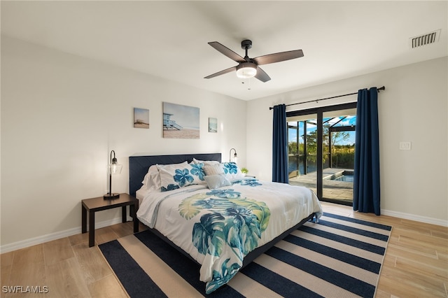 bedroom featuring access to exterior, ceiling fan, and light hardwood / wood-style floors