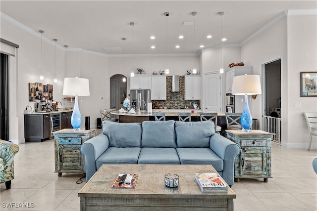 tiled living room with wine cooler and crown molding