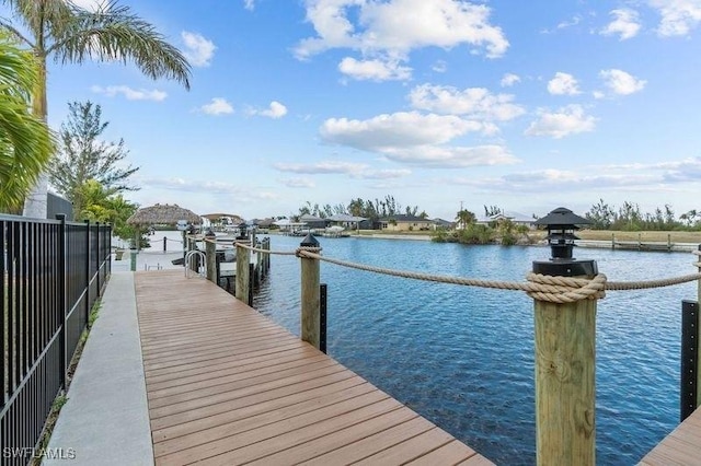 view of dock with a water view