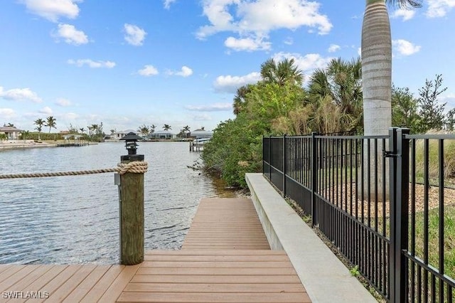 dock area featuring a water view