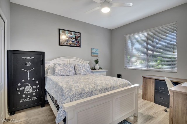 bedroom featuring ceiling fan and light hardwood / wood-style floors