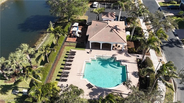 birds eye view of property featuring a water view