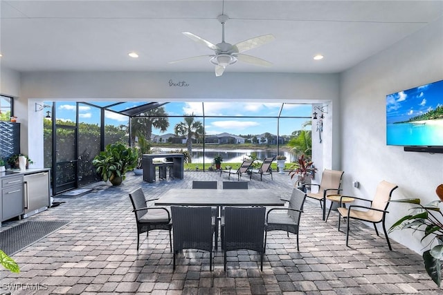 interior space with ceiling fan