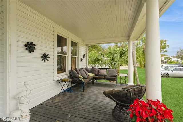 wooden deck featuring covered porch