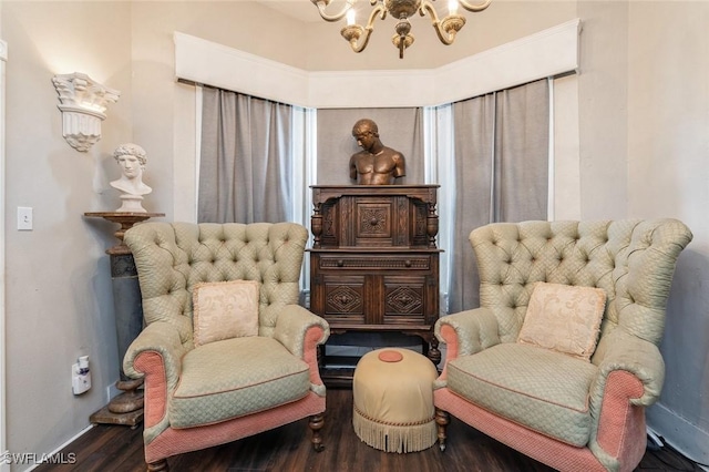 living area with a chandelier and wood-type flooring