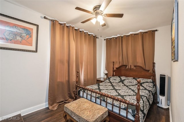 bedroom featuring dark hardwood / wood-style floors and ceiling fan