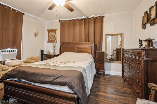 bedroom featuring ceiling fan, cooling unit, and dark wood-type flooring